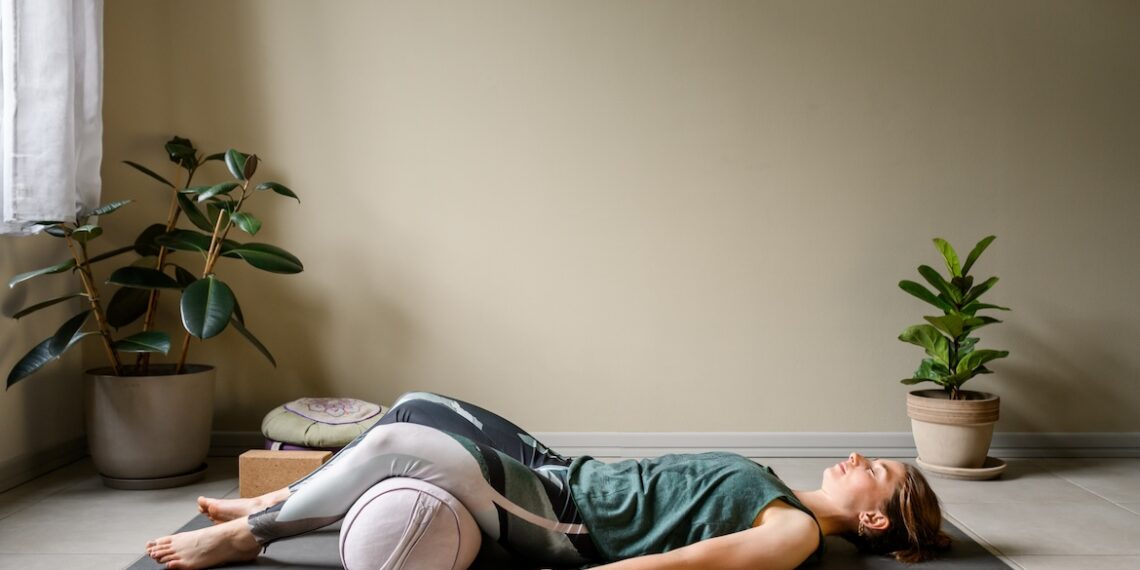 A Bolster Pillow Yoga Flow for Ultimate Relaxation